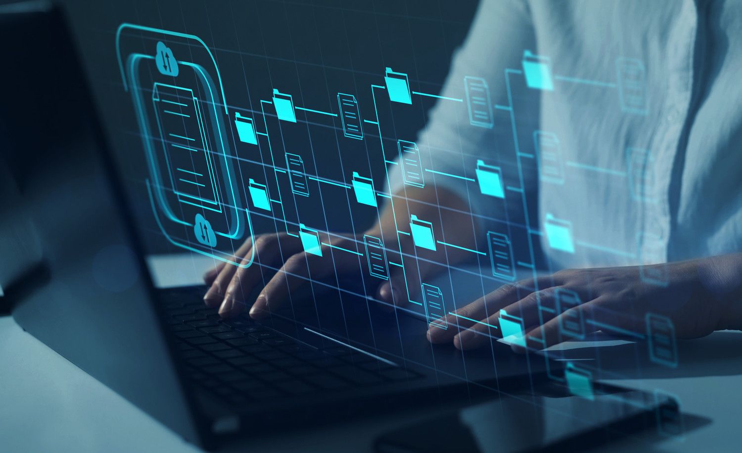 Person using cloud HR software on a laptop