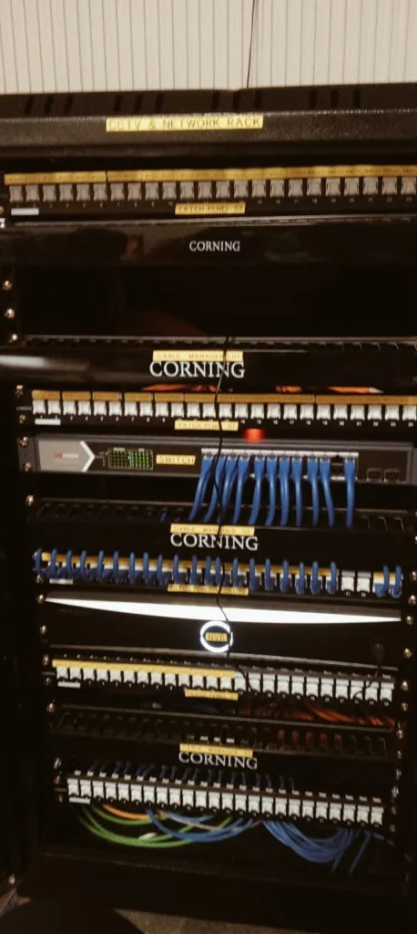 Network rack with patch panels and switches